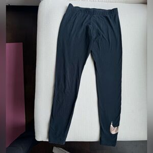 Nike swoosh leggings in black size medium